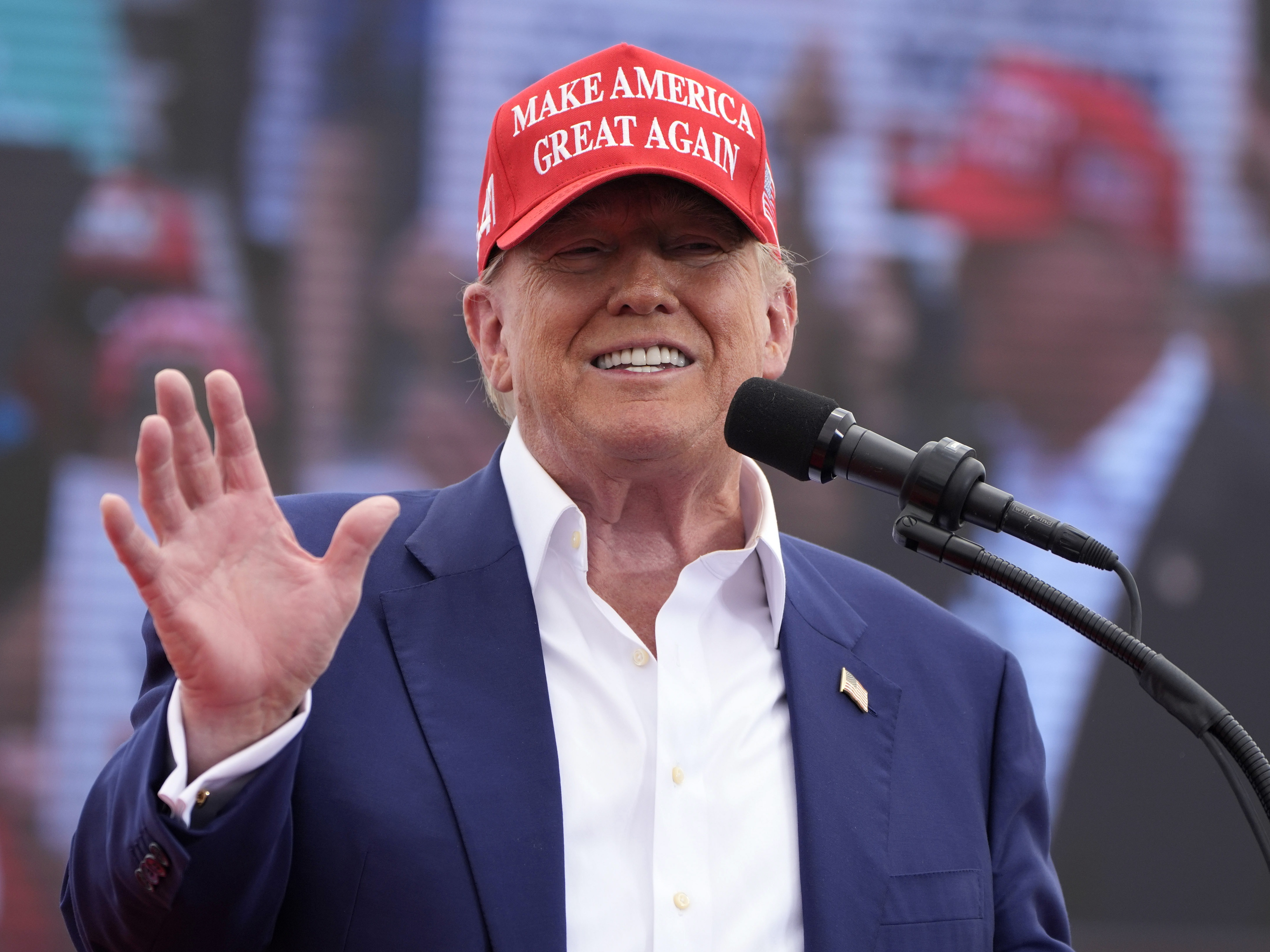 caption: Republican presidential candidate, former President Donald Trump speaks at a campaign rally Sunday in Las Vegas.
