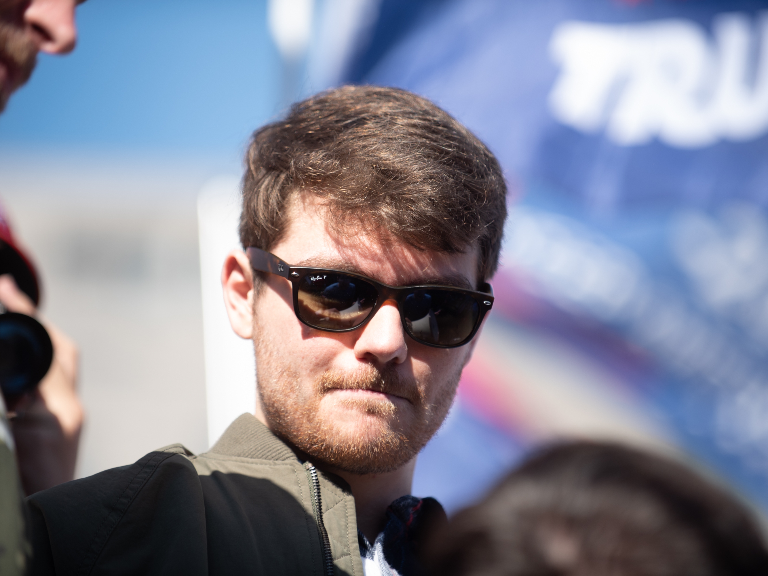 caption: Nick Fuentes, seen here in 2020, is widely known for his white nationalist and antisemitic views, including Holocaust denial. An official in the Trump administration advocated for the social media platform X to remove its ban on Fuentes over hate speech and was also spotted in the crowd at a 2024 Fuentes rally.