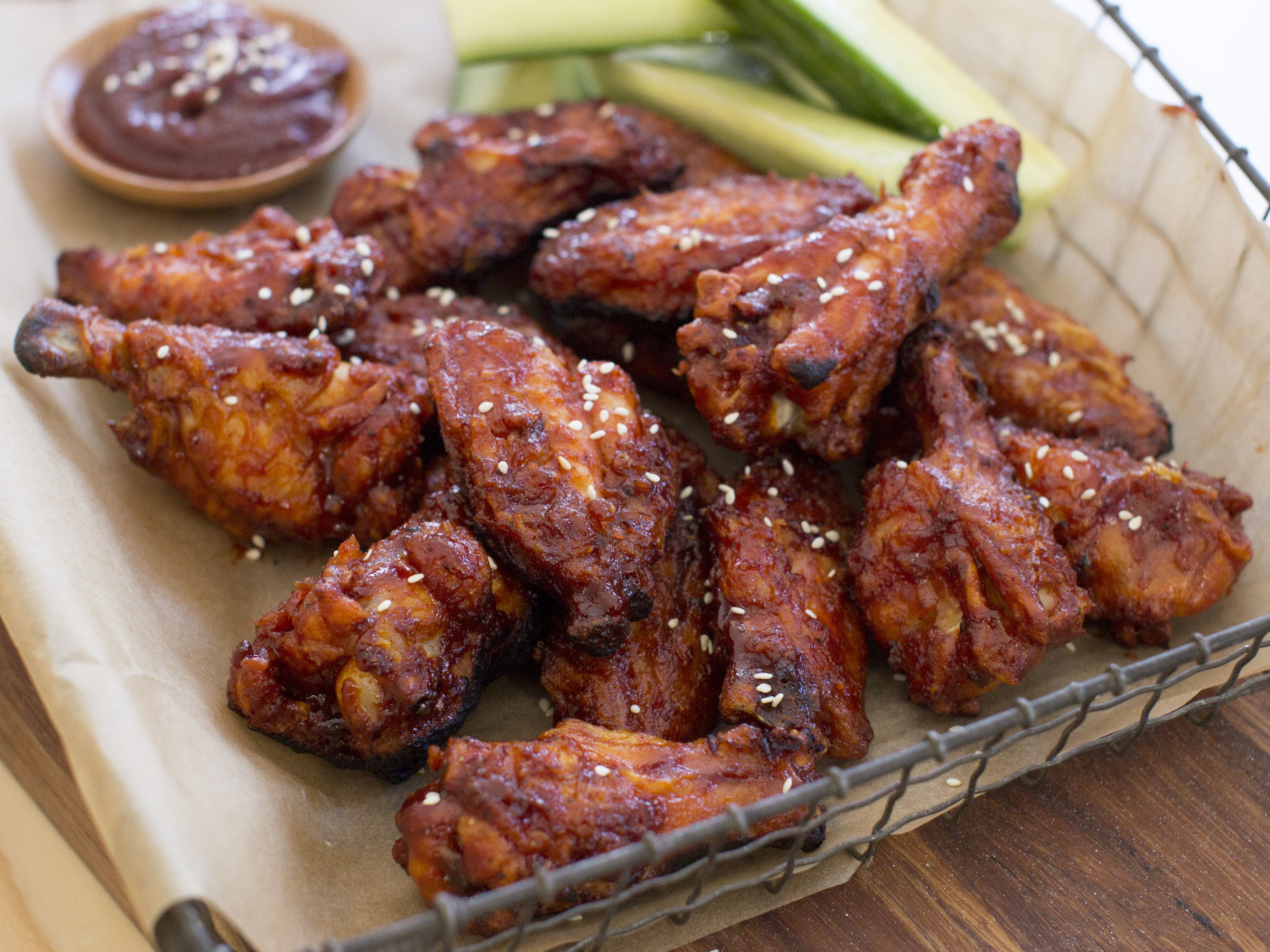 caption: Rest assured, there will be chicken wings available this Sunday. They may just cost more.