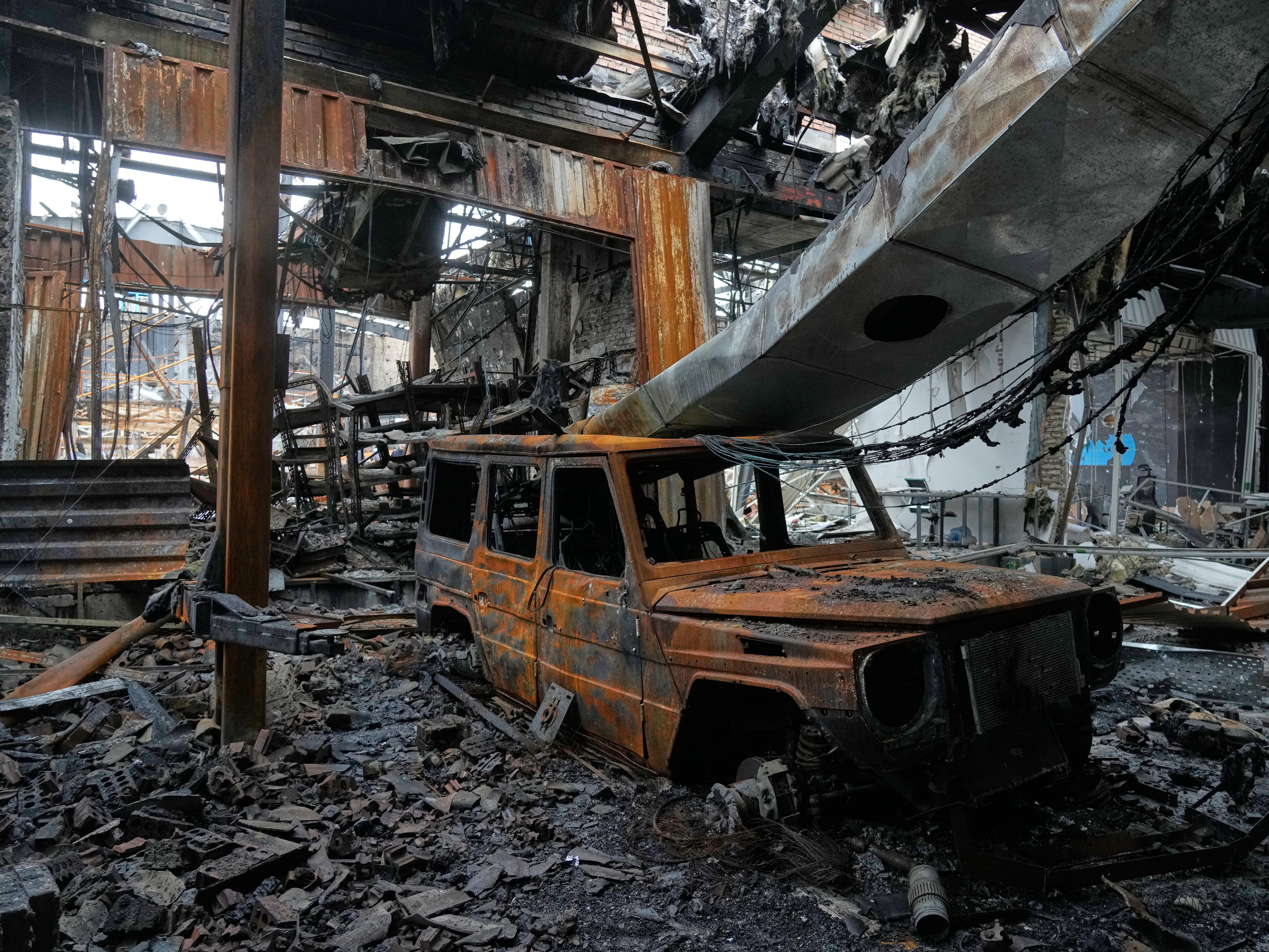 caption: A view of the damages at Hypercar, an auto service center, which according to the company's officials were caused by strikes on March 1, in Tehran, Iran, Saturday, March 28, 2026.