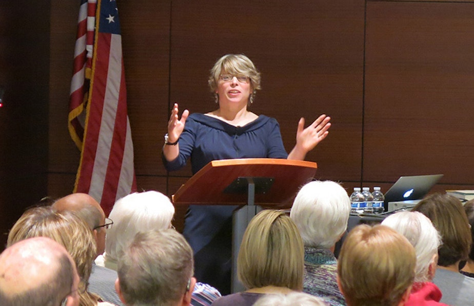 caption: Author and historian Jill Lepore speaking at event for Kansas City Public Library.