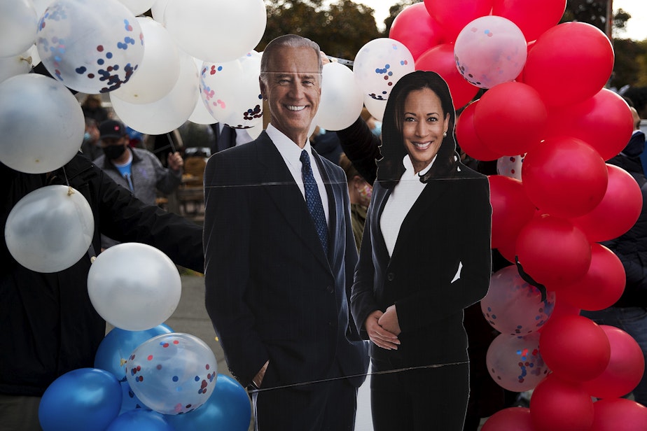 caption: Cardboard cutouts of Joe Biden and Kamala Harris are displayed during an impromptu celebration after the results of the 2020 presidential election were made official on Saturday, November 7, 2020, near the intersection of 10th Avenue and East Pine Street in Seattle.