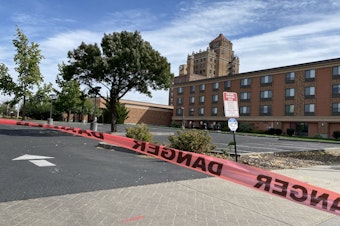caption: The historic Marcus Whitman in Walla Walla is taped off and shut down until officials can learn more about the plume of gasoline underneath some of downtown.<br/>