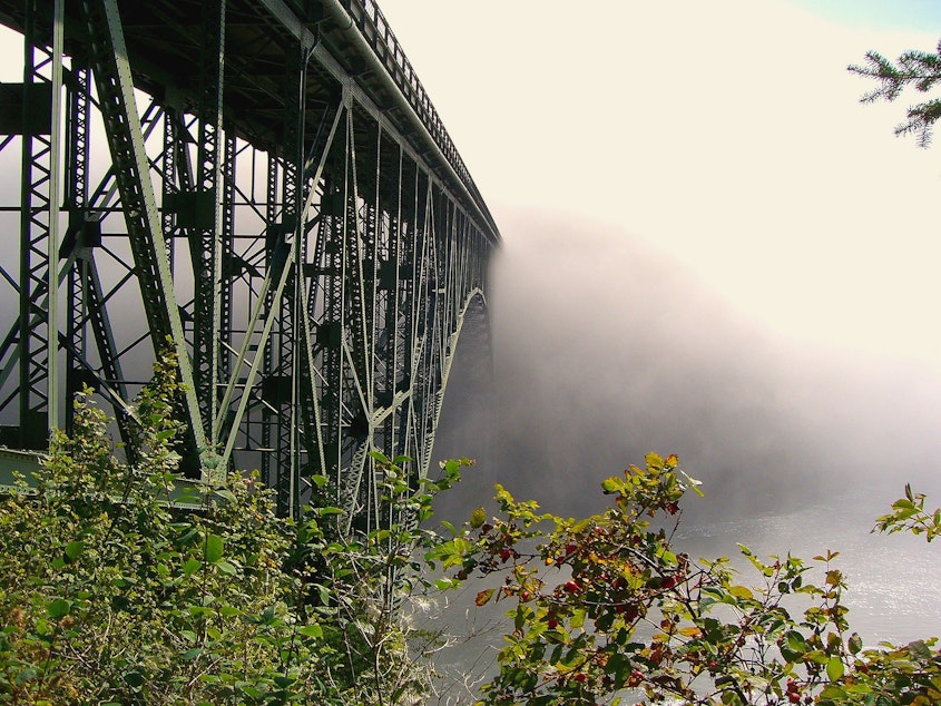 caption: The bridge at Deception Pass, between Whidbey Island and Fidalgo Islands. It got its name from Captain George Vancouver, who felt deceived by the width of the waterway.
