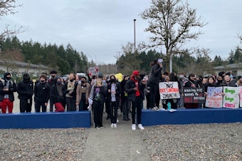 caption: River Ridge High School students gathered on Wednesday, February 2, 2022 to protest racial and sexual violence on campus.