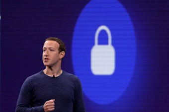 caption: Facebook CEO Mark Zuckerberg speaks during the F8 Facebook Developers conference on May 1, 2018, in San Jose, Calif. He is pledging more enhanced privacy and other features when it comes to private messages.