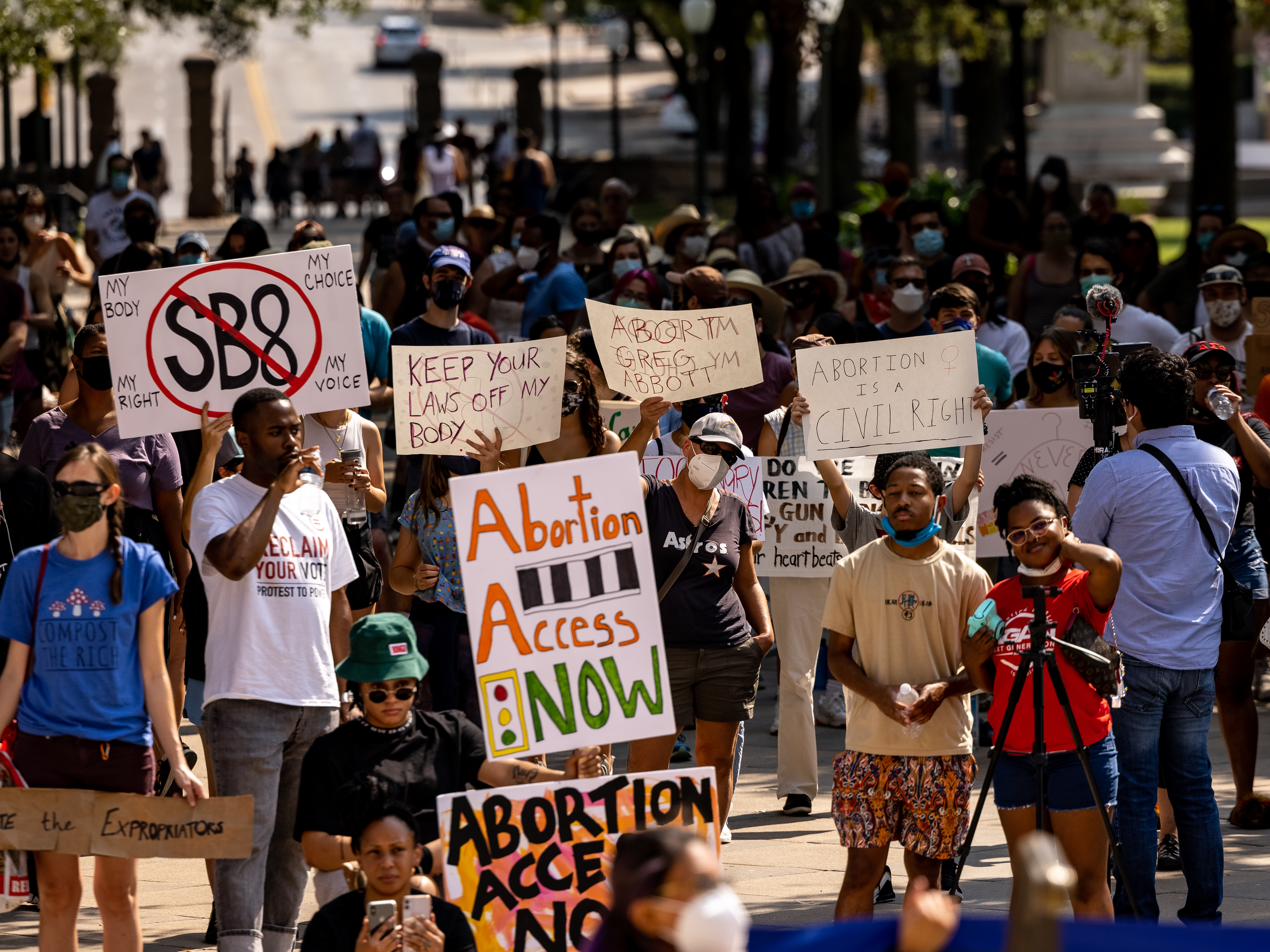caption: Abortion rights activists rally at the Texas State Capitol on Sept. 11, 2021 in Austin.