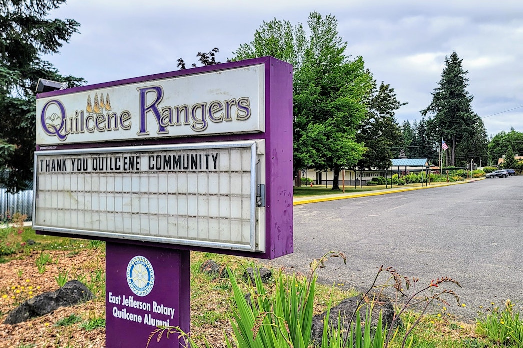caption: Quilcene Schools, home to the elementary, middle, and high schools, is often called the "heart" of town.