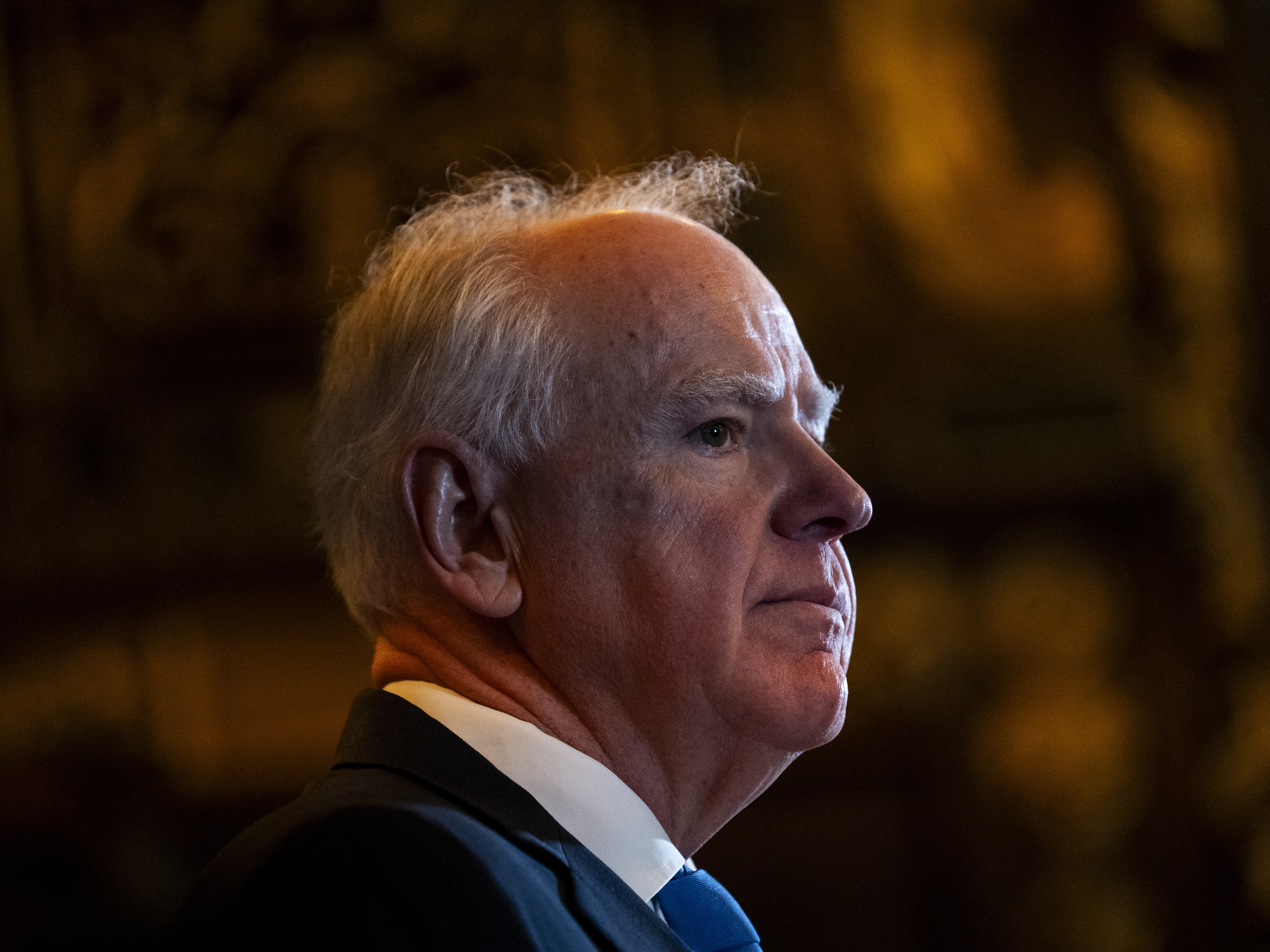 caption: Minnesota Gov. Tim Walz speaks during a press conference at the State Capitol on Jan. 5, 2026 in St. Paul, Minn., where he announced he was abandoning his re-election campaign.