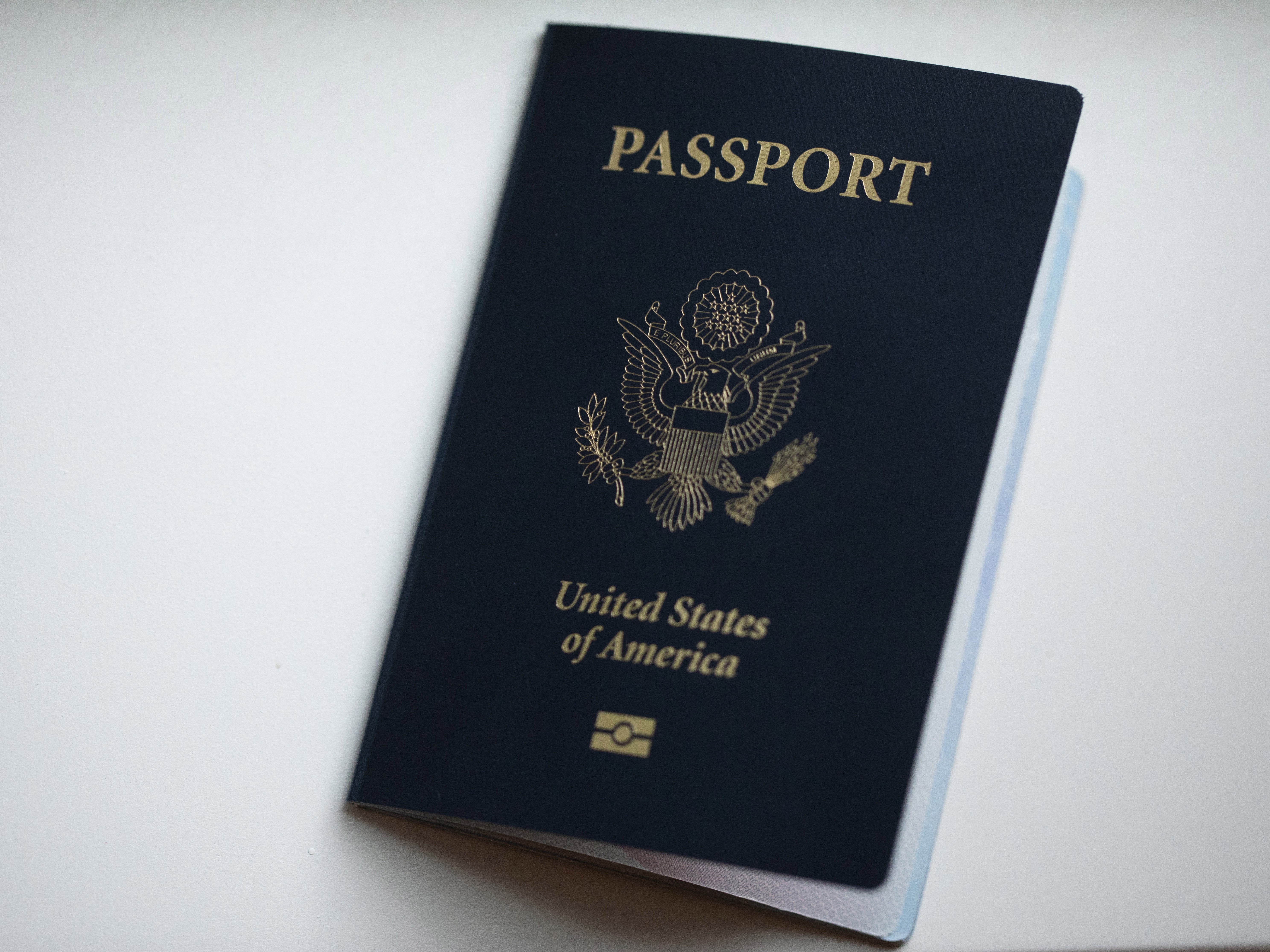 caption: The cover of a U.S. Passport is displayed in Tigard, Ore., Dec. 11, 2021.