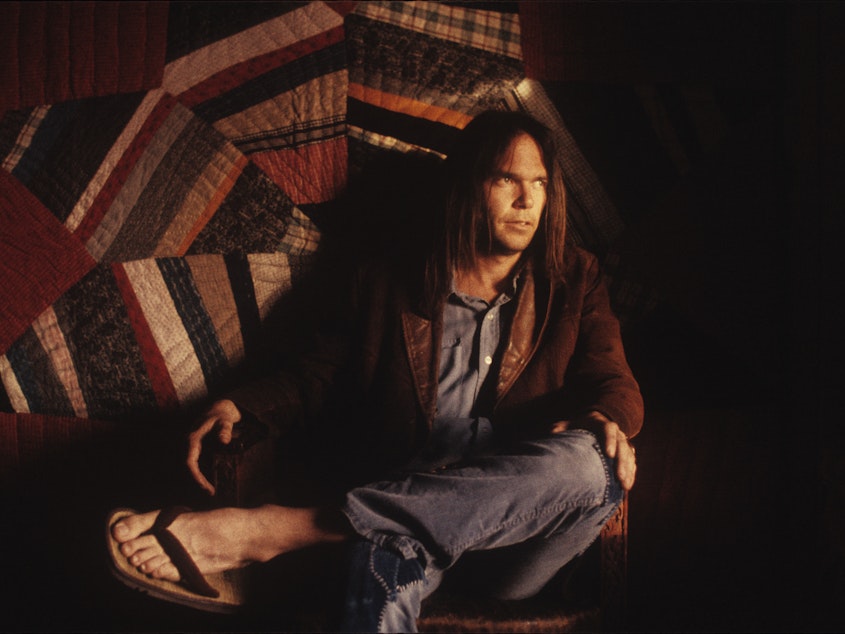 caption: Neil Young's newly released album, <em>Homegrown</em>, arrives at the same moment as two other veteran songwriters, Bob Dylan and Willie Nelson, put out projects of their own.