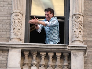 caption: Broadway star Brian Stokes Mitchell — who has recovered from the coronavirus — sings from his window to show appreciation for New York City's healthcare workers and first responders. "People need this, too," he says. "They need that connection. They need to be reconnected to themselves, to their own center, to each other, you know, to feel that we're all in this together."