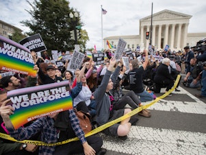 caption: Supporters of LGBTQ rights took to the street in a demonstration in front of the U.S. Supreme Court last October.