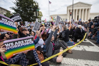caption: Supporters of LGBTQ rights took to the street in a demonstration in front of the U.S. Supreme Court last October.