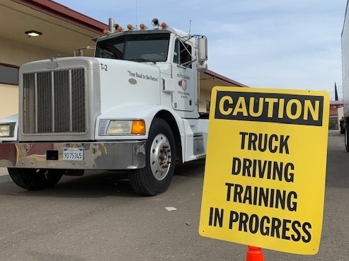 caption: Students at Patterson High School in Patterson, Calif., are participating in the one of the first truck-driving programs for students at a non-vocational high school in the country.