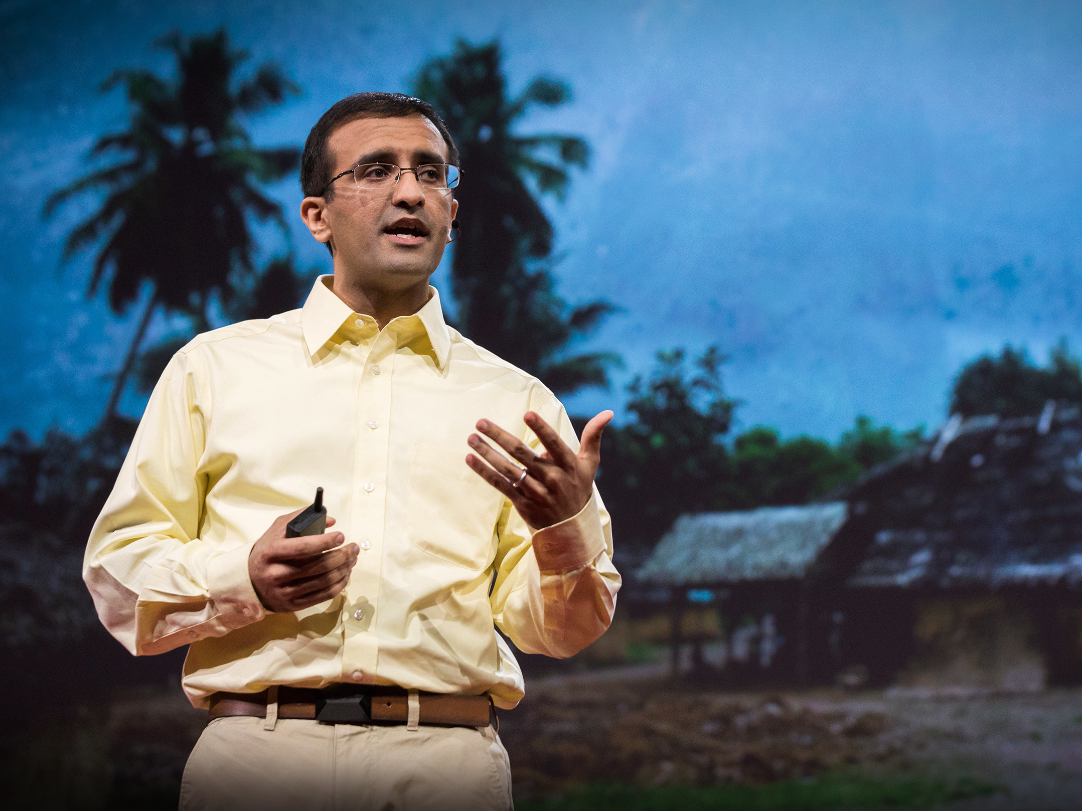 caption: Raj Panjabi on the TED stage.
