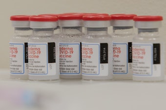 caption: Vials of the Moderna COVID-19 vaccines are seen at the Covenant Place facility in Sumter, S.C.