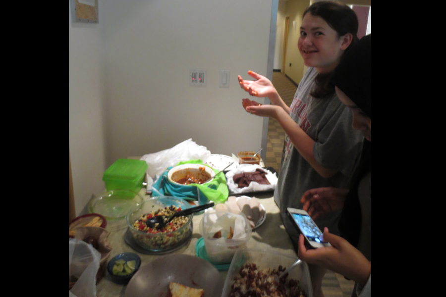 caption: Julia Furukawa enjoying the RadioActive potluck