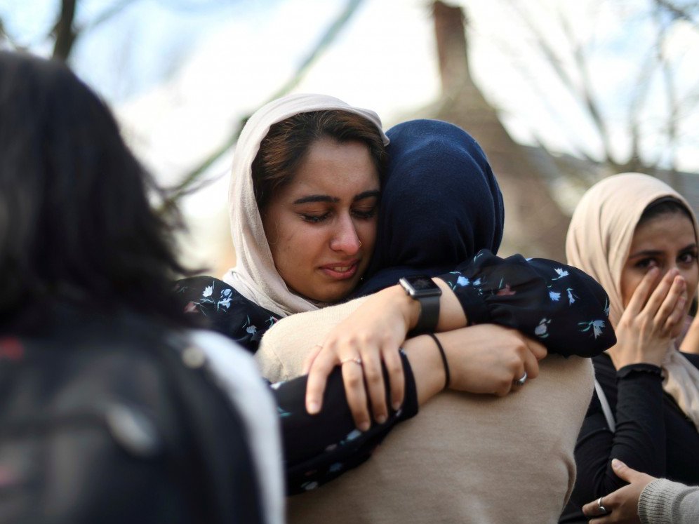 caption: Nayab Khan, 22, cries at a vigil to mourn for the victims of the Christchurch mosque attacks in New Zealand, at the University of Pennsylvania in Philadelphia, Pennsylvania, on Friday.