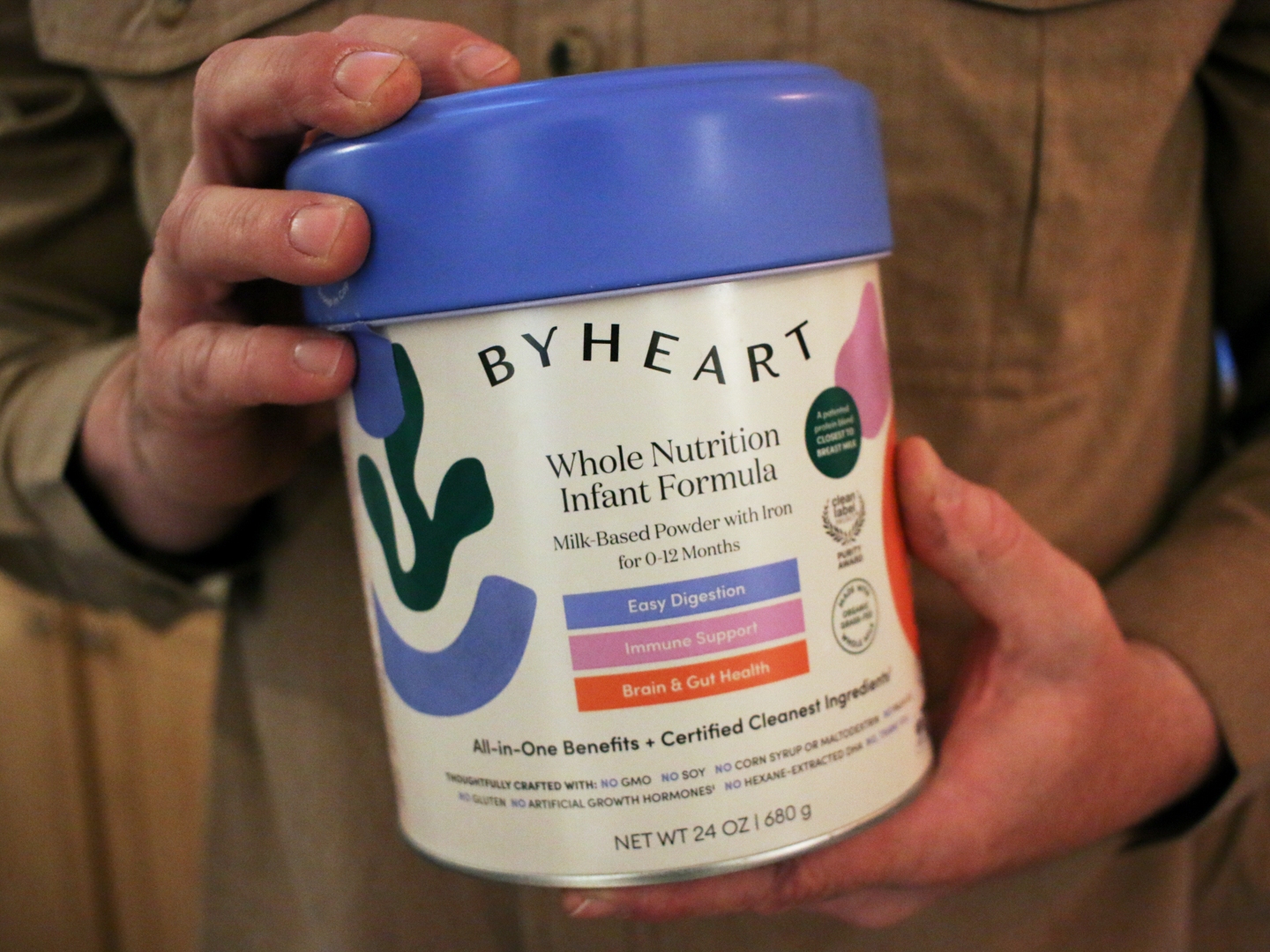 caption: FILE - Stephen Dexter holds a container of ByHeart baby formula, which was recently recalled by ByHeart, in Flagstaff, Ariz., on Wednesday, Nov. 12, 2025.