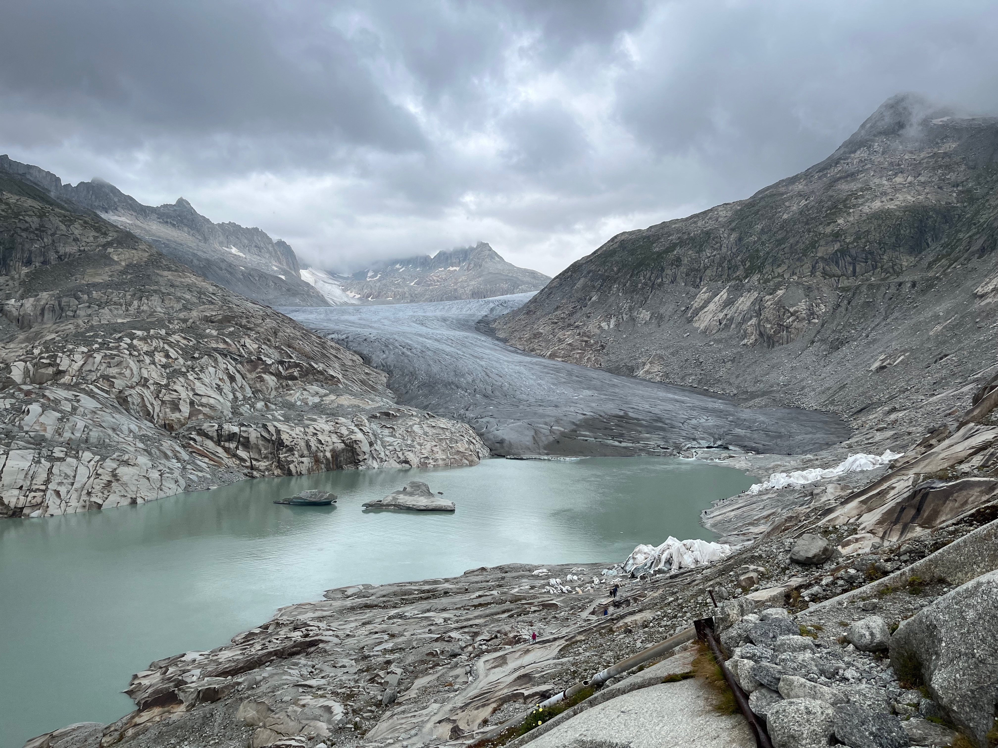 caption: The Rhône Glacier in Switzerland is the source of the Rhône River, which flows through Switzerland and France. Swiss glaciers like this one are melting quickly, reduced by nearly two-thirds of their ice over the past century.