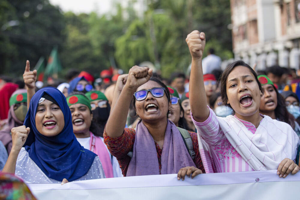 caption: Students shout slogans during a protest demanding the trial of former Prime Minister Sheikh Hasina in Dhaka, Bangladesh. (Rajib Dhar/AP)