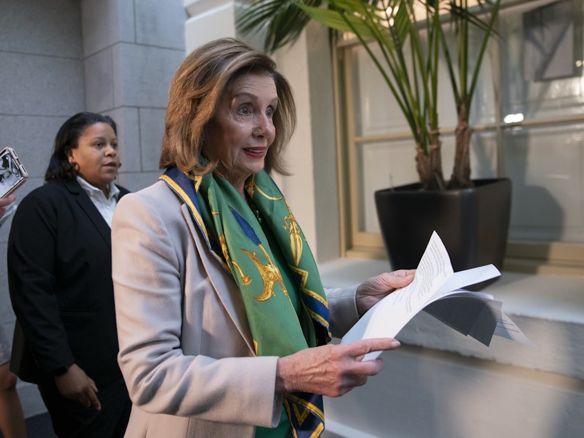caption: Speaker Nancy Pelosi told Democrats the House will vote to send the articles of impeachment against President Trump to the Senate Wednesday