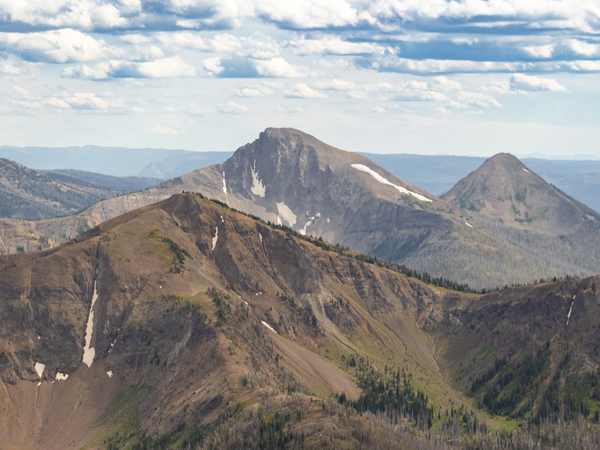 caption: First Peoples Mountain is the new name for a peak formerly named after a white man who helped lead an attack that left more than 170 Native Americans dead.