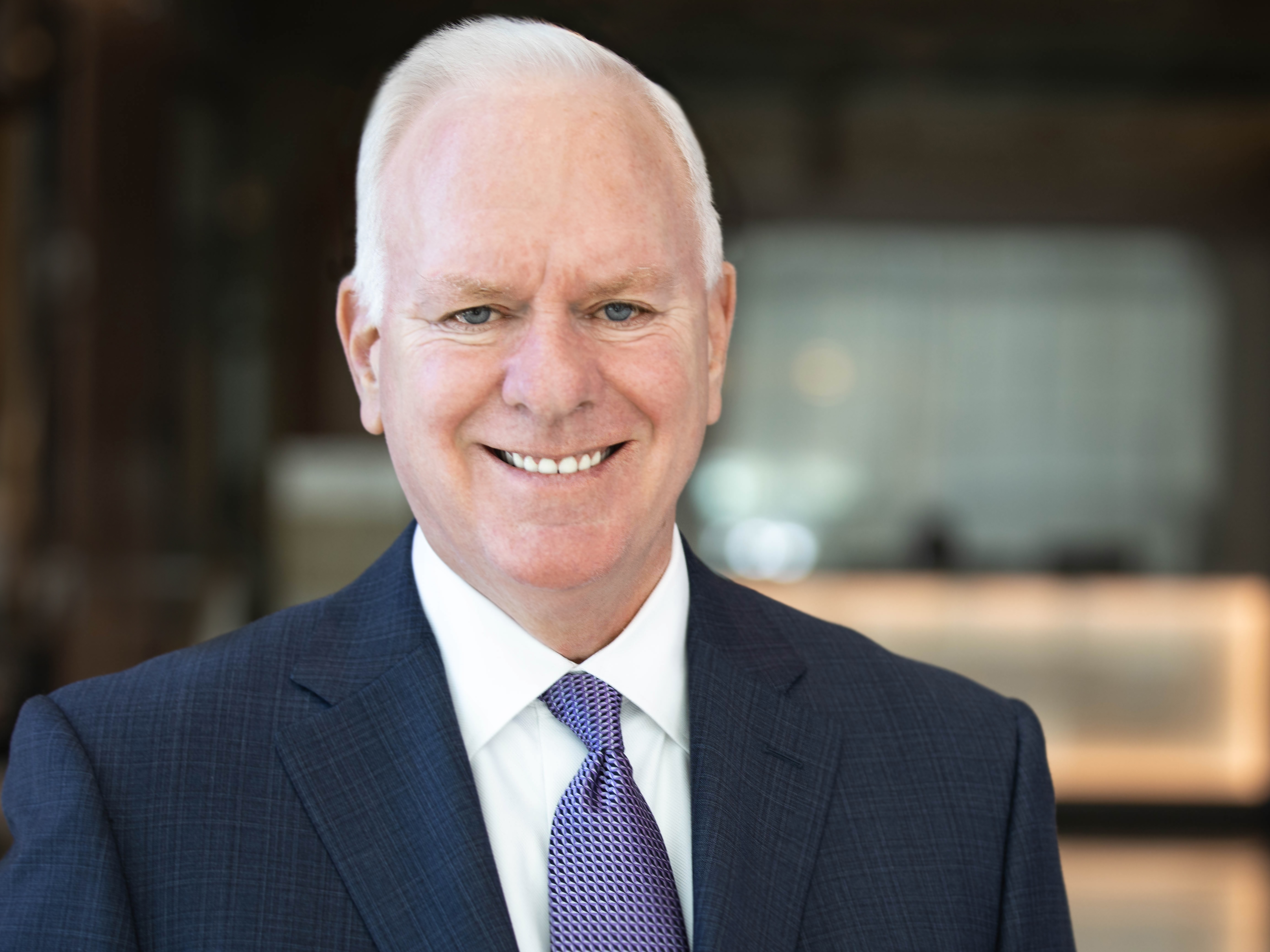 caption: NPR President and CEO John Lansing plans to step down in December, nine months before his term is set to end.