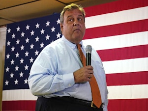 caption: Former New Jersey Gov. Chris Christie addresses a gathering during a campaign event in Concord, N.H. on July 24, 2023.