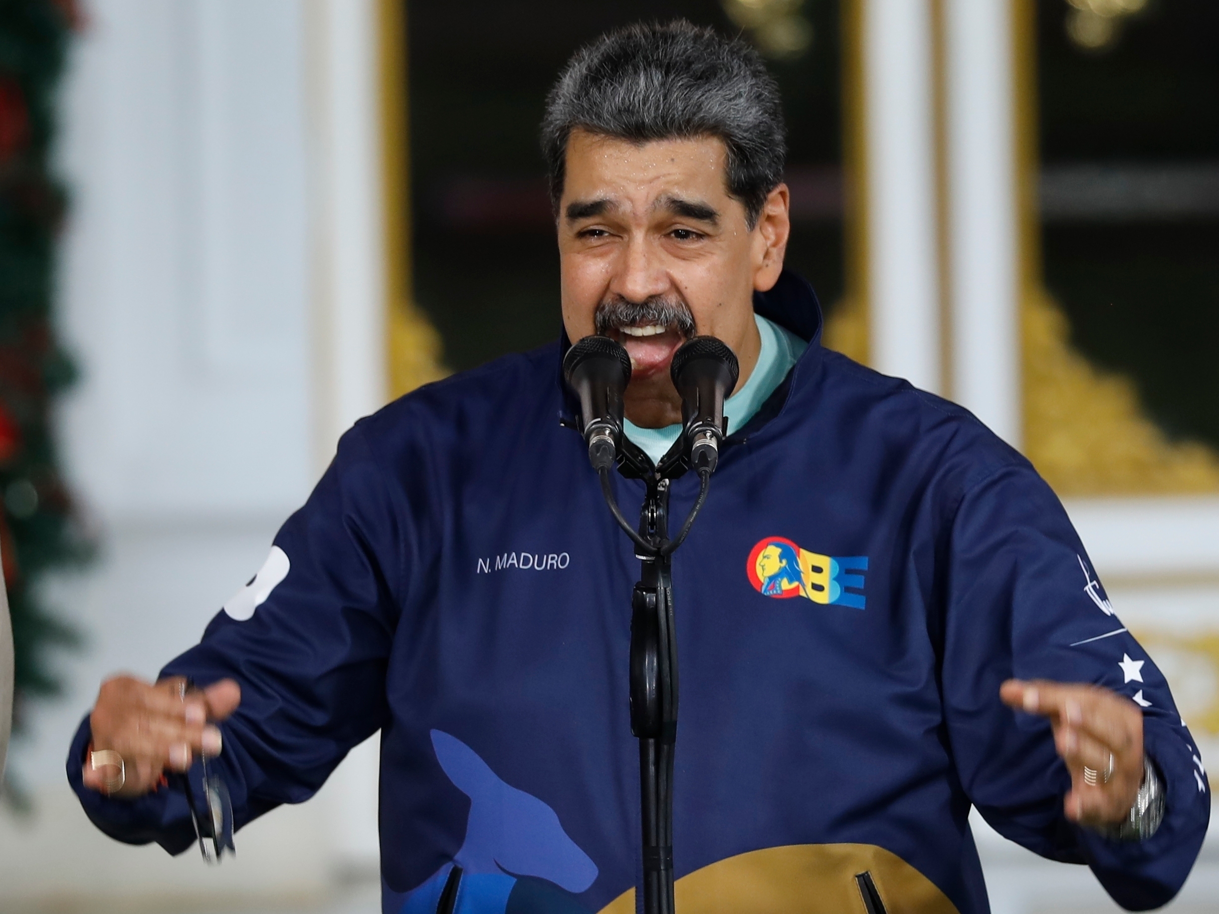 caption: Venezuelan President Nicolas speaks during a Student Day event at the Miraflores presidential palace in Caracas, Venezuela, Friday, Nov. 21, 2025.
