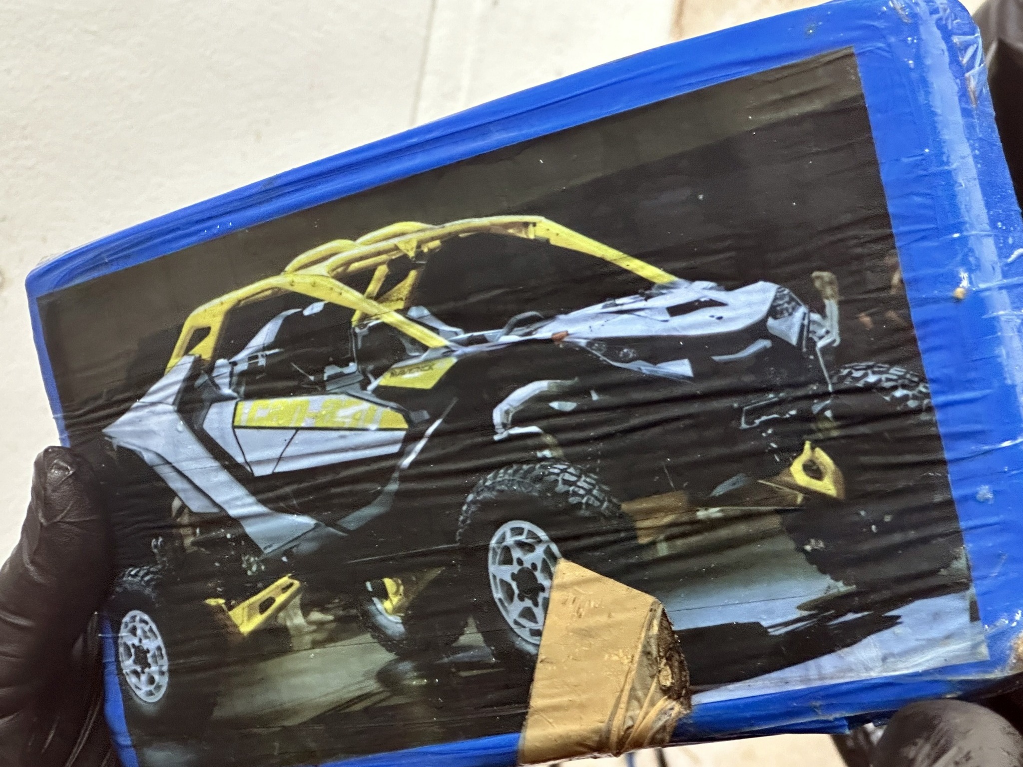 caption: A package containing 16 bricks of suspected cocaine was discovered by guests on a beach in the Florida Keys, according to authorities.