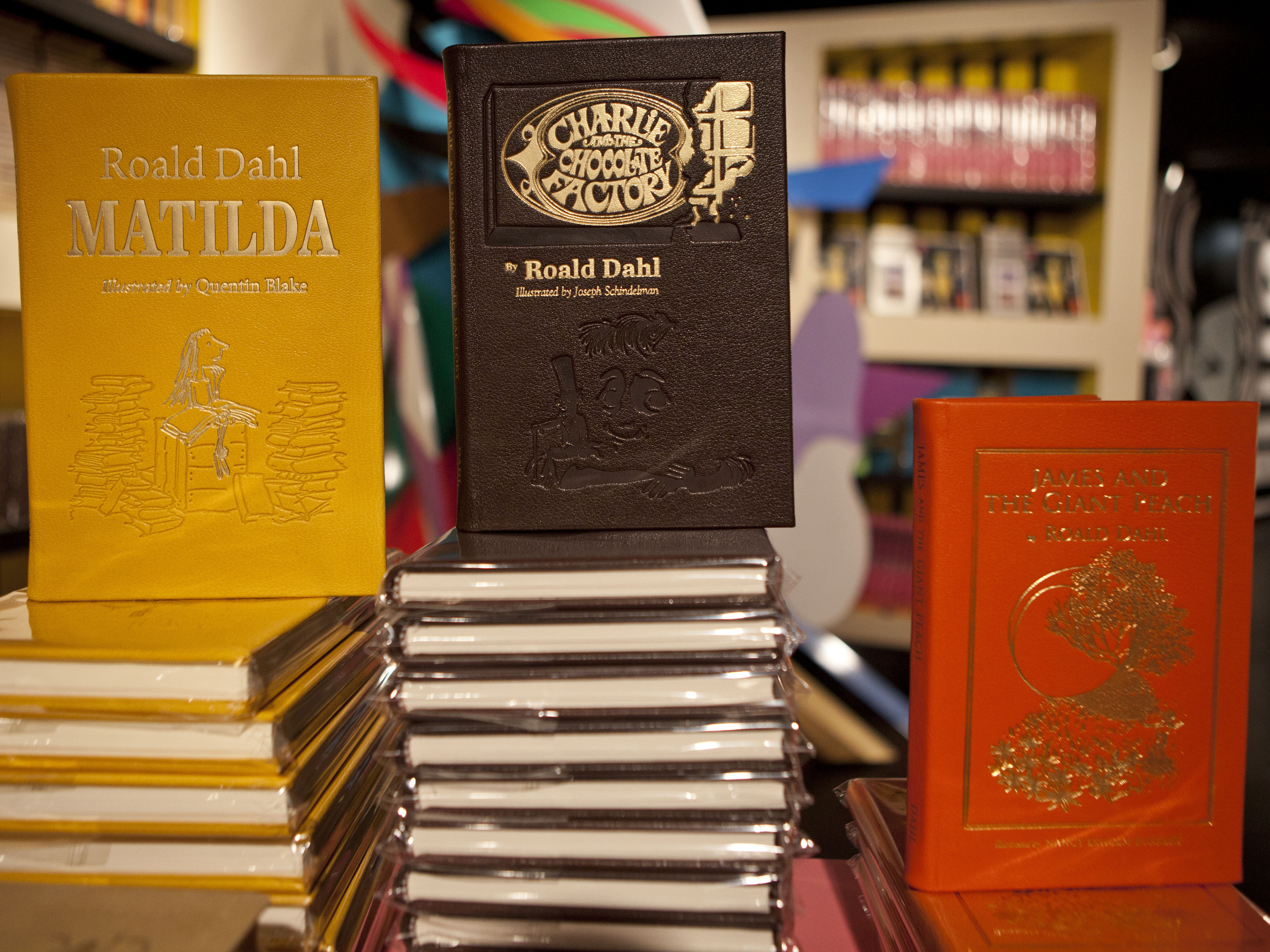 caption: Books by Roald Dahl are displayed in New York in 2011. New editions are being altered to remove words deemed offensive.