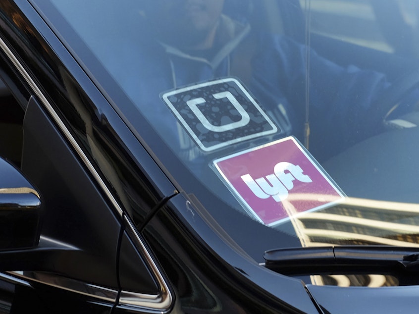 caption: Uber and Lyft are rideshare companies.