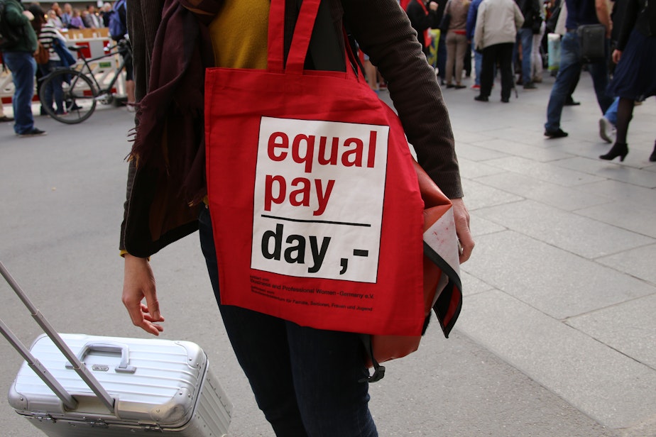 caption: April 12 is National Equal Pay Day