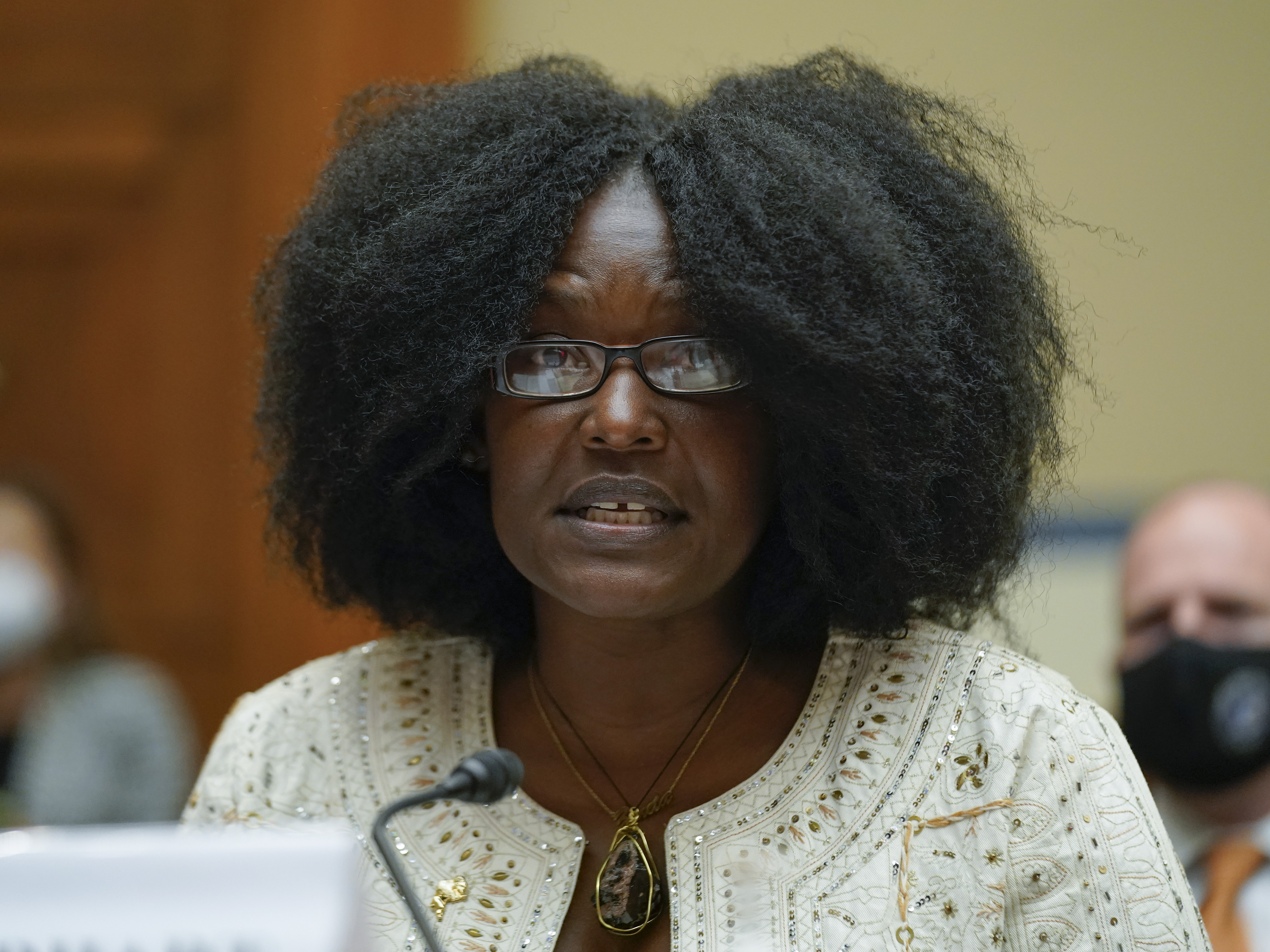 caption: Zeneta Everhart, whose son, Zaire Goodman, 20, was shot during the Buffalo Tops supermarket mass shooting and survived, testifies during a House Committee on Oversight and Reform hearing on gun violence on Capitol Hill on Wednesday.