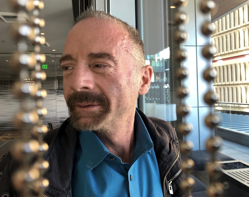 caption: Timothy Ray Brown poses for a photograph, Monday, March 4, 2019, in Seattle. Brown, also known as the "Berlin patient," was the first person to be cured of HIV infection, more than a decade ago. Now researchers are reporting a second patient has lived 18 months after stopping HIV treatment without sign of the virus following a stem-cell transplant. But such transplants are dangerous, cannot be used widely and have failed in other patients. 