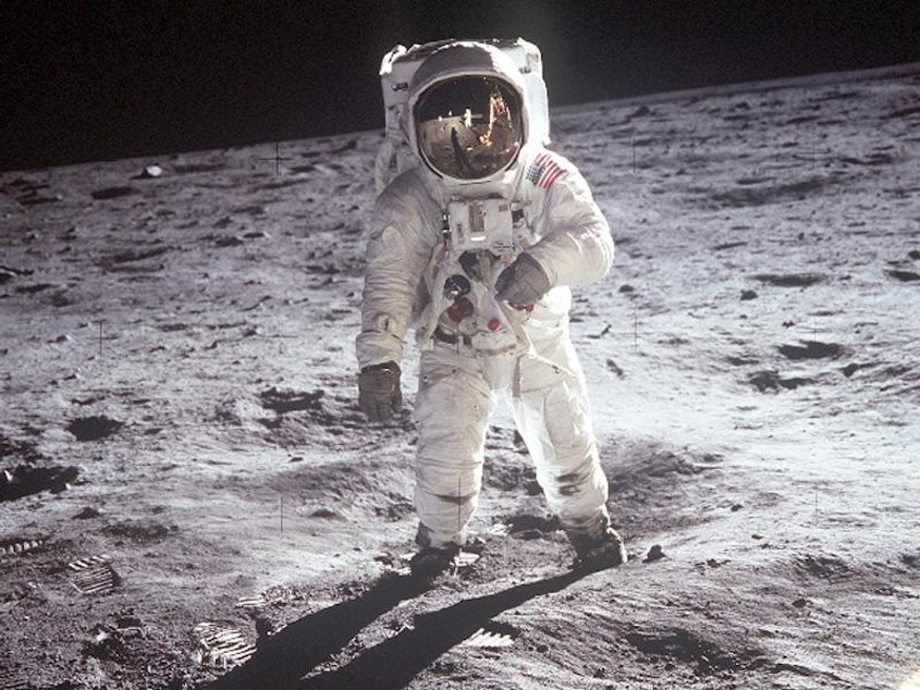 caption: Buzz Aldrin walks on the moon in 1969.
