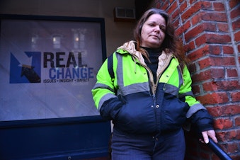 caption: Darcie Day heads out to sell Real Change newspaper in Seattle after shooting in the 'Jungle.'