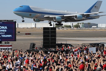 caption: Air Force One lands at Phoenix Goodyear Airport for a campaign rally less than a week before Election Day.