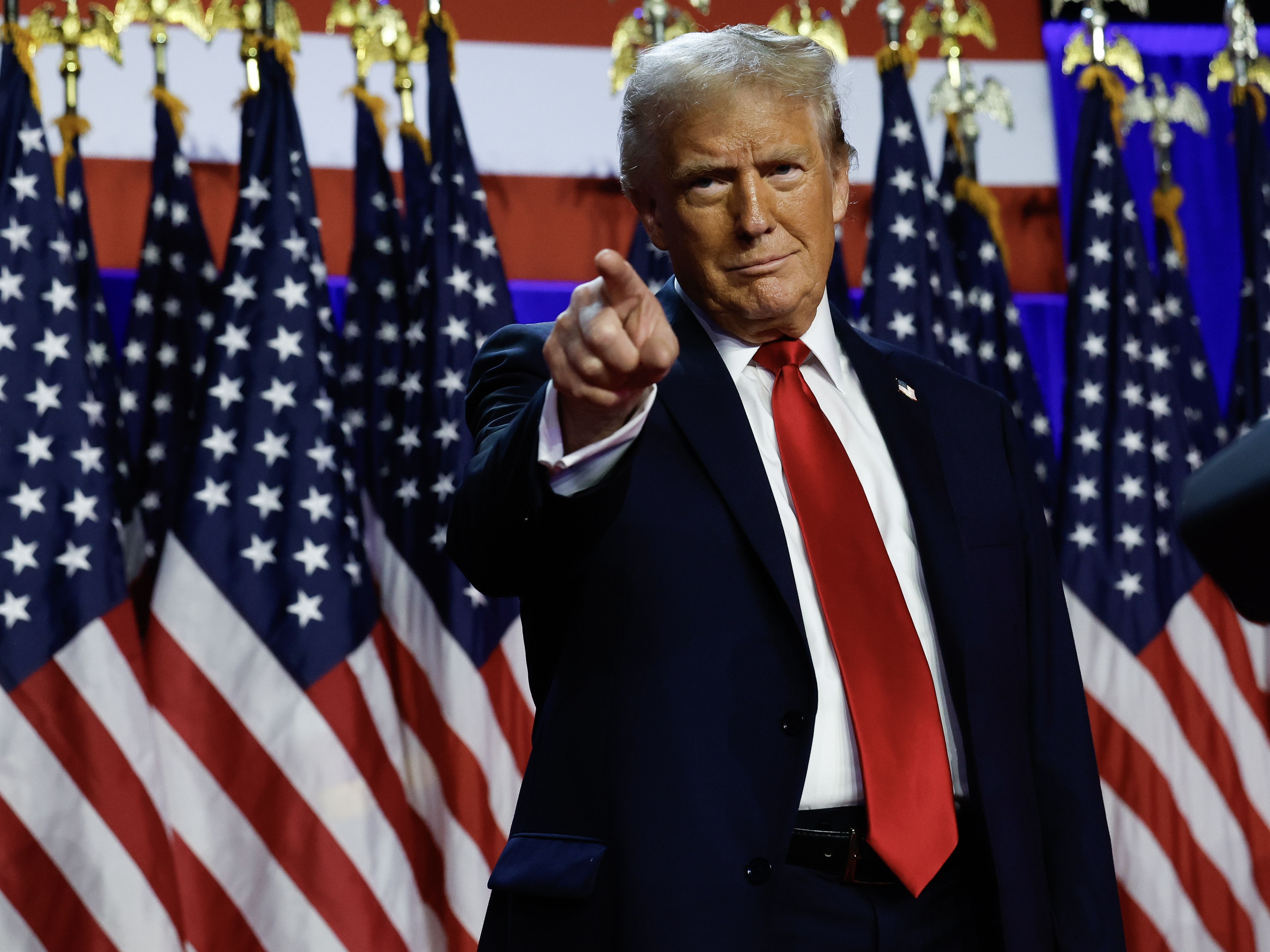 caption: Former President Donald Trump arrives to speak during an election night event in West Palm Beach, Fla., in the early morning hours on Wednesday.