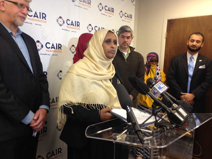 caption: Asha Gobana says a man pointed a gun at her outside a 7-Eleven, exposed himself and made anti-Muslim threats.