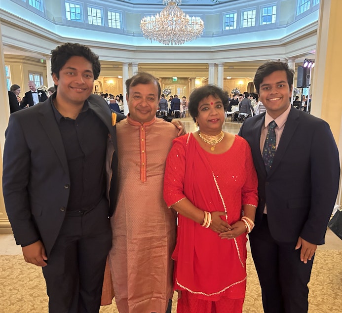 caption: Amit Bandyopadhyay and his wife, Susmita Bose with their sons, Shohom Bose-Bandyopadhyay(left) and Aditya Bose-Bandyopadhyay(right). 
