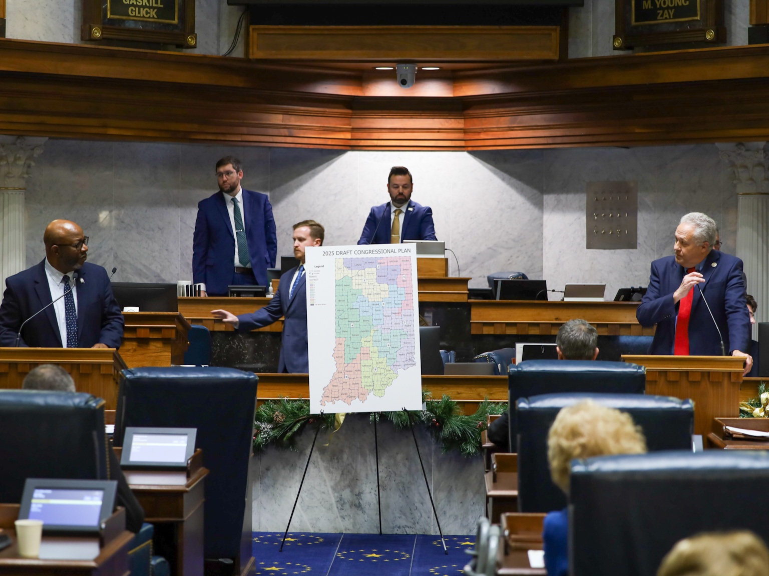 caption: Members of the Indiana Senate debate the redistricting plan backed by President Trump in the state capitol Thursday.