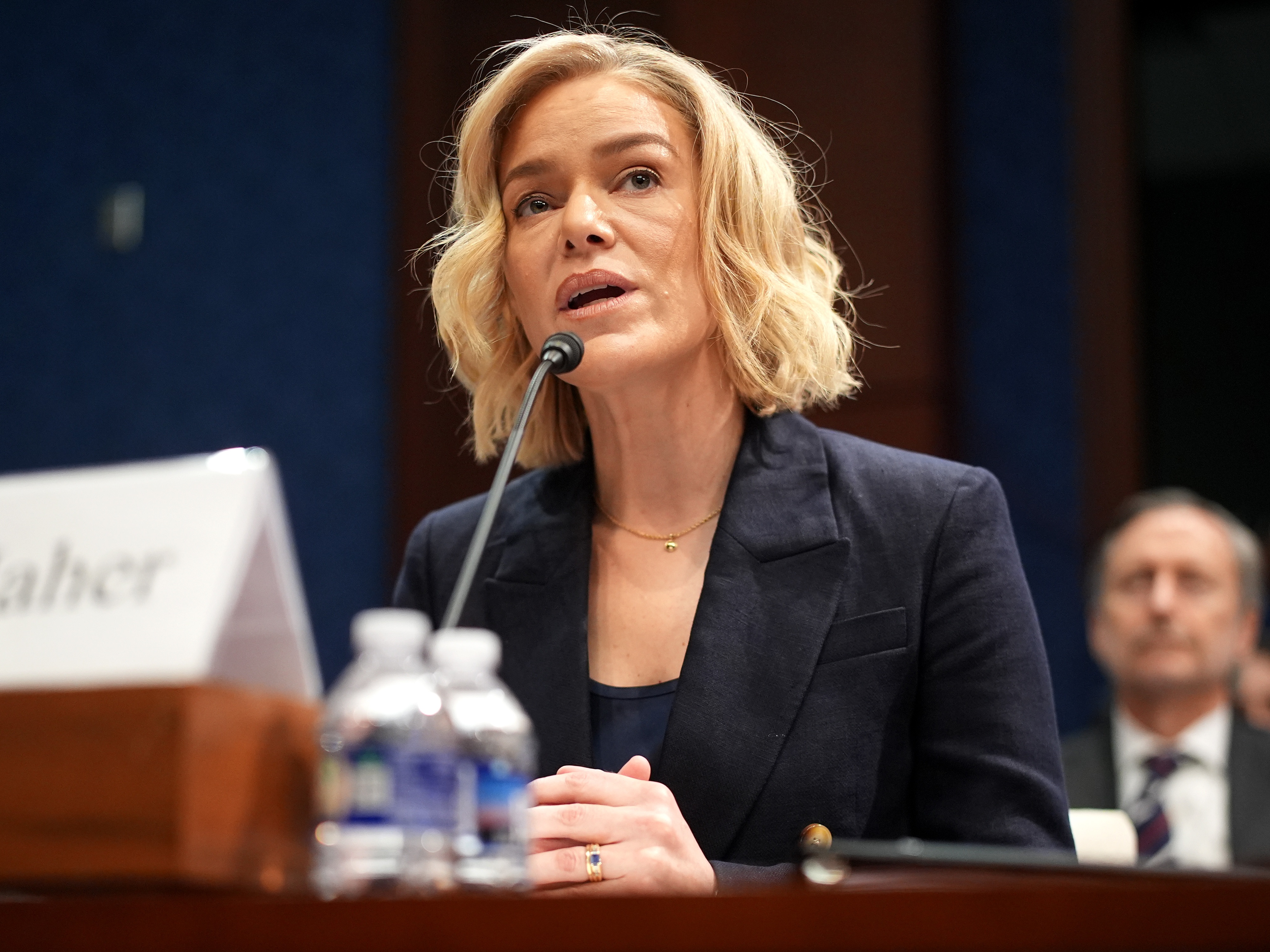 caption: NPR President and CEO Katherine Maher testifies during a House Oversight and Government Reform Committee hearing at the U.S. Capitol on March 26, 2025. NPR and several member stations are suing the Trump administration over an executive order directing the Corporation for Public Broadcasting to stop funding NPR and PBS.