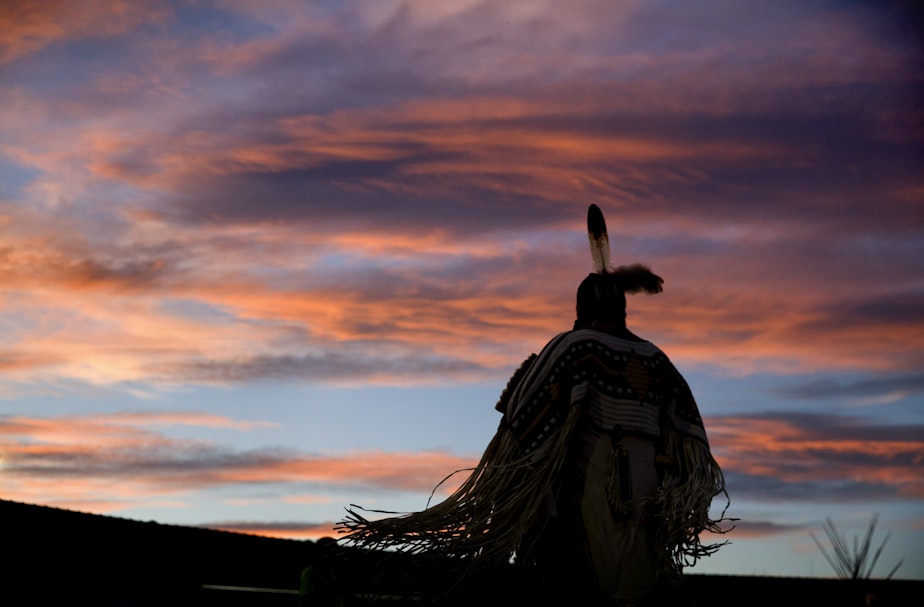 caption: A woman performs a traditional Native American dance during the North American Indian Days celebration on the Blackfeet Indian Reservation in Browning, Mont., Friday, July 13, 2018. CREDIT: DAVID GOLDMAN/AP