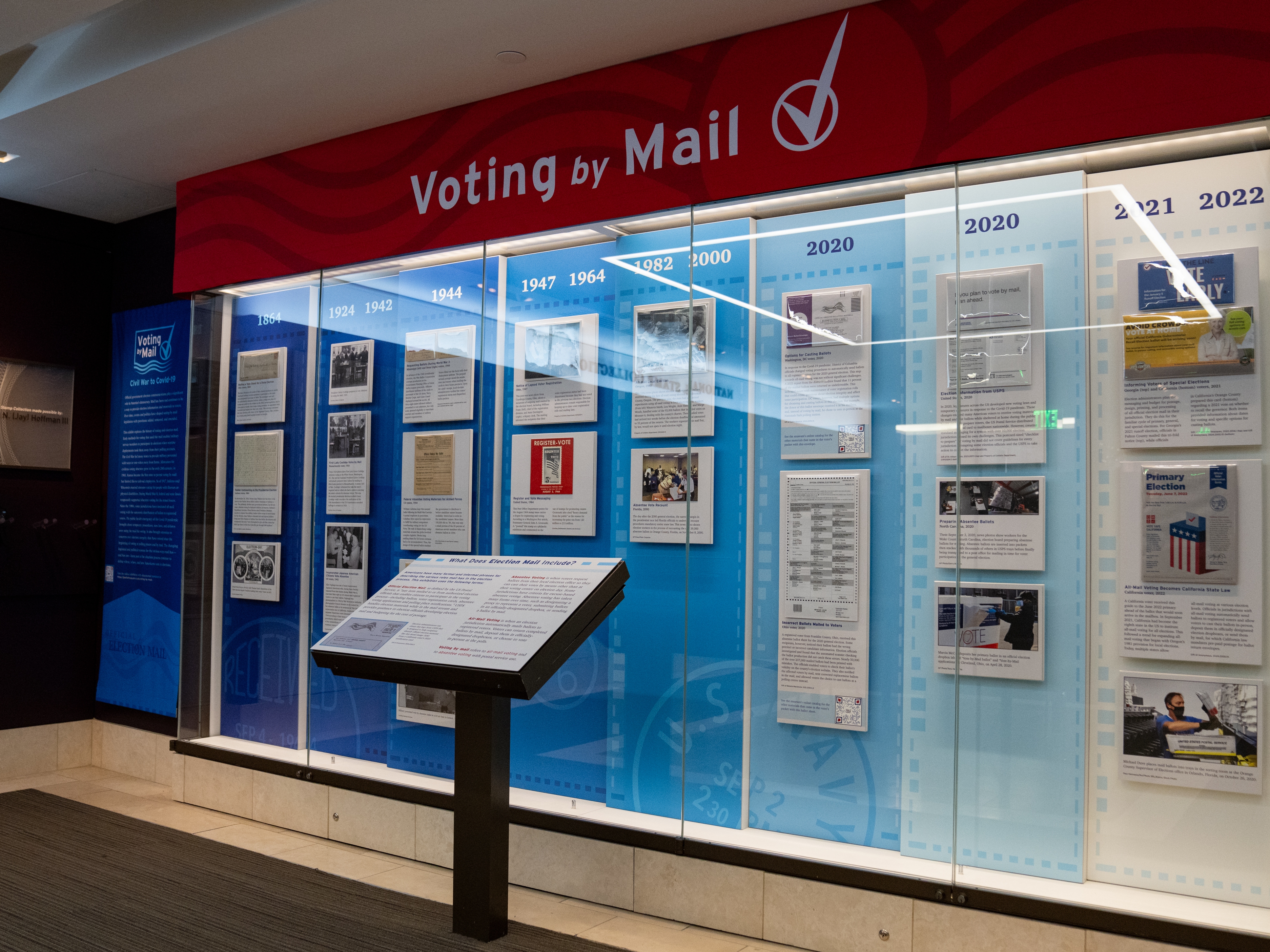 caption: The “Voting by Mail” exhibition at the National Postal Museum in Washington, D.C., tracks the long history of mail-in voting in the United States with a selection of historical ballot envelopes, election mailers and photographs.