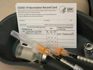 caption: Immunity Americans acquired through vaccination or via prior infection with the SARS-CoV-2 virus may account for the lighter than expected COVID surge in the U.S. this winter, researchers say.