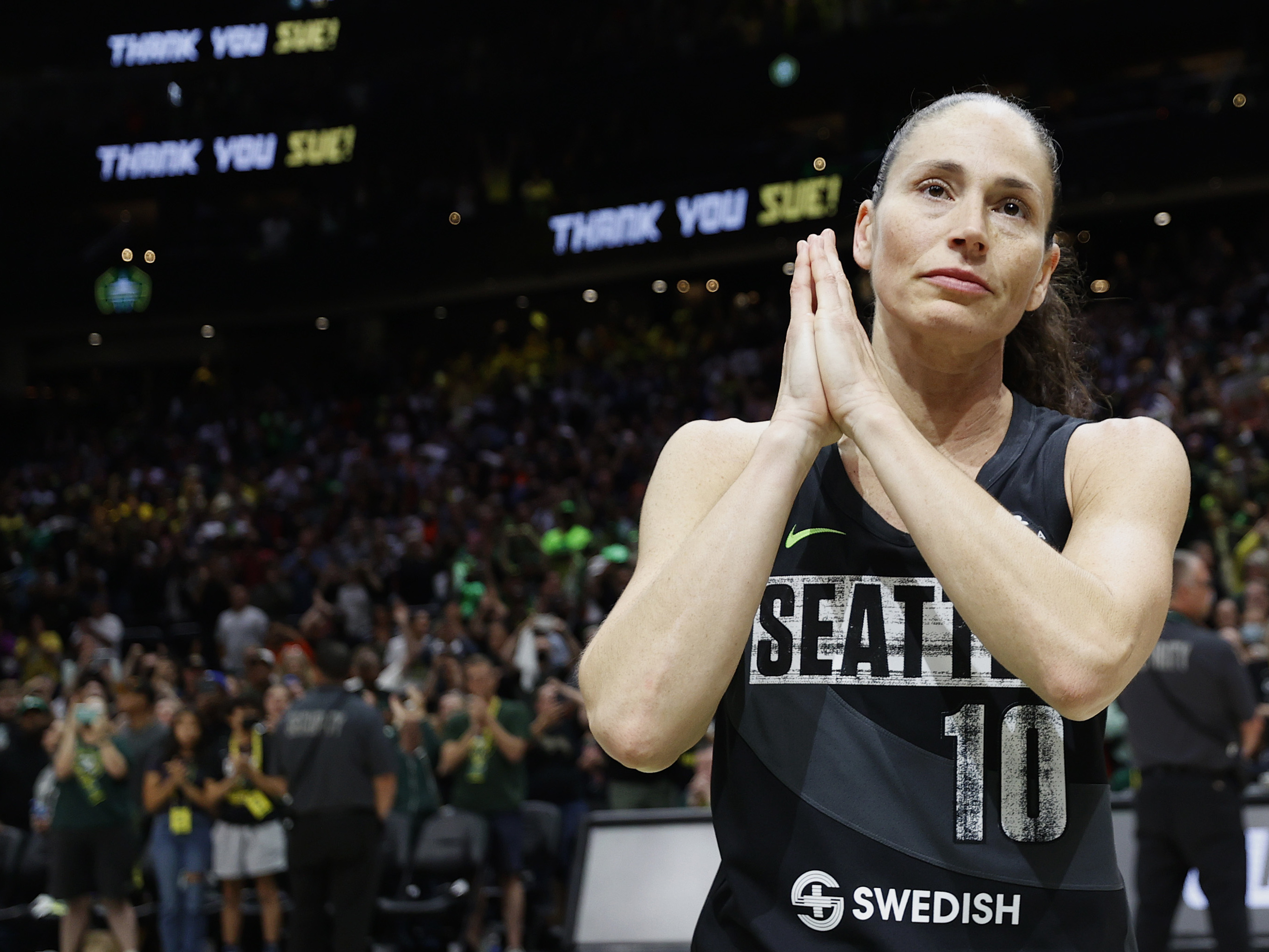 caption: Sue Bird reacts after Tuesday's game, the last of her career, at the 2022 WNBA Playoffs semifinals in Seattle, Wash.