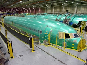 caption: Unfinished fuselages for the Boeing 737 during production at the Spirit AeroSystems factory in Wichita, Kan.